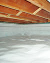 a moisture barrier installed on the walls and floors of a crawl space in Crystal Falls