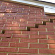 stair step cracking on a foundation wall in Houghton