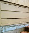 an old-fashioned crawl space door in Hurley about to be replaced