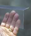 Closeup of a clear plastic covering on a Minocqua crawl space block wall