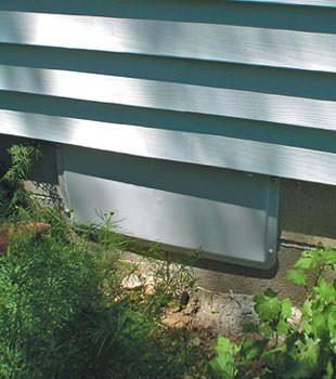 A gray crawl space vent cover in Washburn