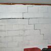 A buckling foundation wall in a Chassell home.