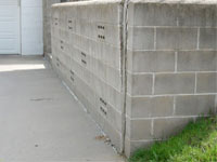 A retaining wall separating from the adjoining walls in Calumet