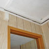 The ceiling and wall separating as the wall sinks with the slab floor in a Ontonagon home