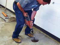 Coring the concrete of a concrete slab floor in Woodruff
