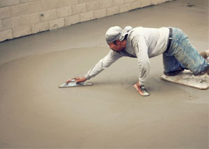 smoothing out the grout in a slab releveling project in Eagle River