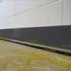 a sinking floor leaving a large gap between the wall and floor in a Baraga home