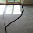 a huge crack in a concrete slab floor in Marquette