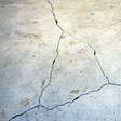 foundation heaving cracks in a slab floor in Iron Mountain