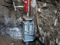 Foundation repair contractors lifting a structure in Houghton.