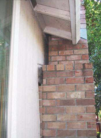 sinking, leaning chimneys that are in danger of collapse in Lac Du Flambeau