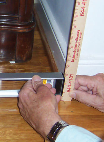 sinking, uneven floors above a sagging crawl space in Three Lakes