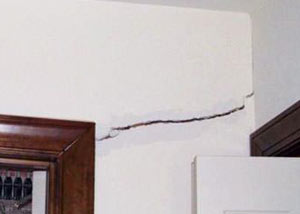 A large drywall crack in an interior wall in Ironwood