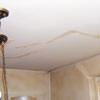 Drywall cracks in Escanaba that were poorly patched and repaired.