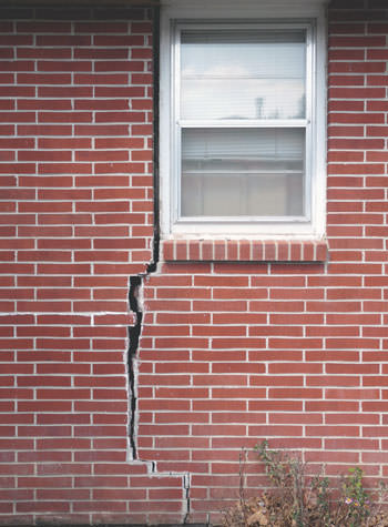 severe foundation wall cracks along a window in Wakefield