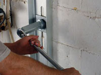 Mounting a foundation wall channel anchor in Eagle River.