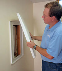 wall anchor covers installed in a foundation repair for a Bessemer home.