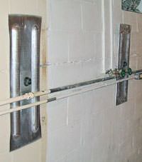 A foundation wall anchor system used to repair a basement wall in Chassell