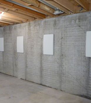 Wall anchor covers covering a foundation wall repair system in Minocqua, Park Falls, Woodruff, Crystal Falls, L'Anse, Washburn, Ontonagon