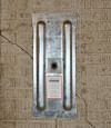 A fully exposed wall anchor plate installed along a Calumet foundation wall