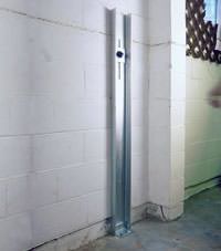A failing foundation wall repaired with a foundation wall channel anchor system in a Iron Mountain home.