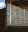I-beam foundation wall supports installed in a Atlantic Mine basement.