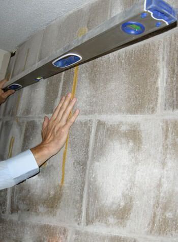severe foundation wall failure symptoms of a basement wall in Calumet