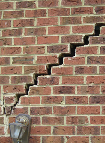 major cracking of a brick foundation wall in Butternut