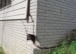 A severely damaged foundation wall in Iron River
