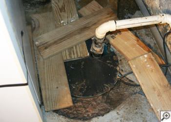 An ugly, clogged sump pump system in Eagle River, Michigan and Wisconsin