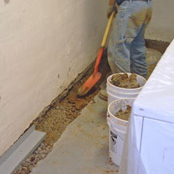 Digging a trench for a French Drain system in Ashland