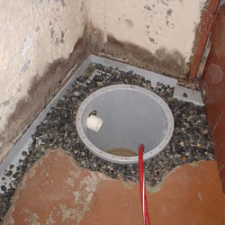Installing a sump in a sump pump liner in a Marquette home