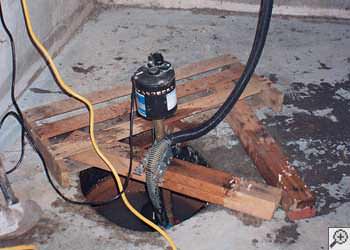 A L'Anse sump pump system that failed and lead to a basement flood.