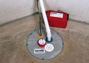 A sump pump system with a battery backup system installed in Chassell