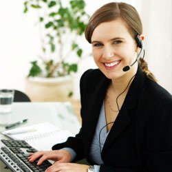 A disaster restoration customer service expert in Iron Mountain manning the phones