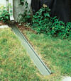 A recessed gutter drain extension installed in Saint Germain, Michigan and Wisconsin