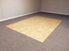 Tiled and carpeted basement flooring options for basement floor finishing in Escanaba