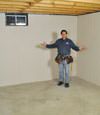 Eagle River basement insulation covered by EverLast™ wall paneling, with SilverGlo™ insulation underneath