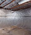 An energy efficient radiant heat and vapor barrier for a Saint Germain basement finishing project