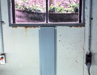 Repaired waterproofed basement window leak in Iron Mountain